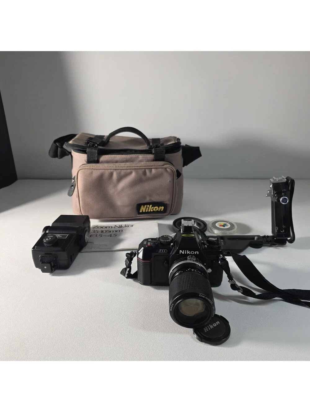 Nikon N2000 35mm Film Camera w/ Nikon Nikkor 35-105mm f3.5-4.5 Zoom Lens Bundle